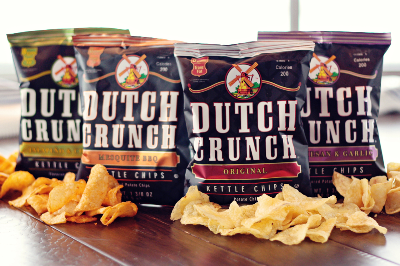 Four flavors of old dutch crunch kettle cooked chips including Jalapeno and Cheddar, Mesquite BBQ, Original, and Parmesan and Garlic.