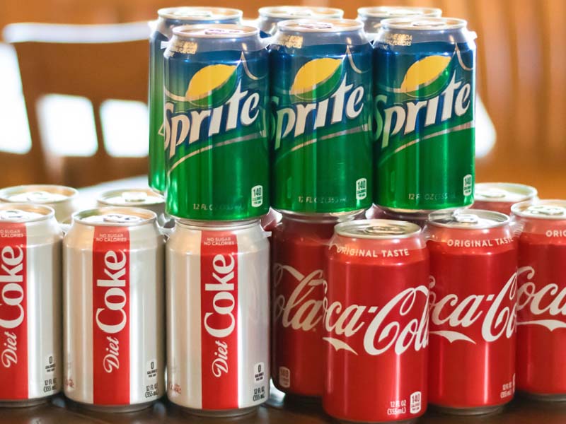 Three Six Packs of canned diet coke, coca-cola, and sprite